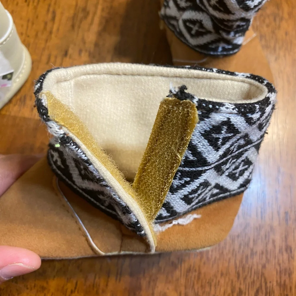 Child of mine and unbranded pair of boots. (2pair) Size 2.  Infant winter boots.